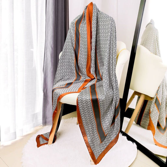 Écharpe Noir Dégradé Marron – Élégance et Charme Intemporel